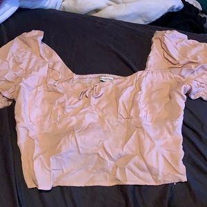 pink cropped shirt